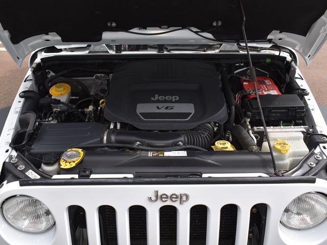 ジープ・ラングラーアンリミテッド スポーツ　４ＷＤ　スミティビルト製ルーフテント　オーニング　バハラックルーフキャリア　ナビＴＶ　バックカメラ　後期モデル　クルーズコントロール　背面タイヤカバー　サイドカメラ　キーレス　ＥＴＣ　ワンオーナー車（75枚目）