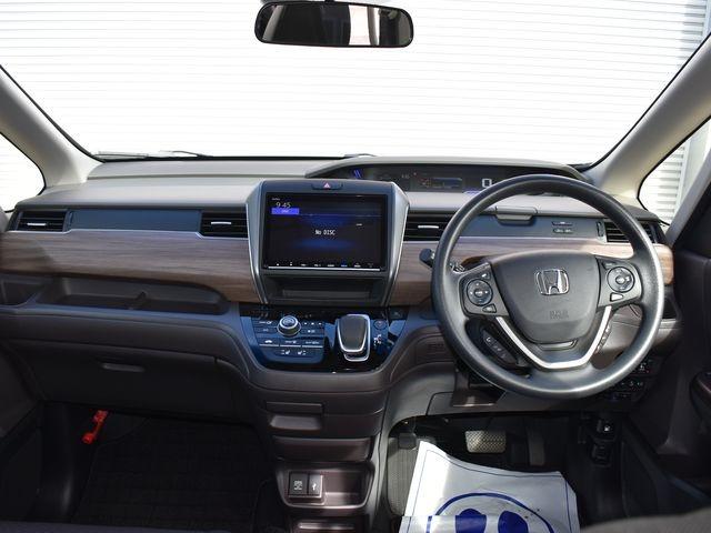 フリード＋ハイブリッド ハイブリッドＧ　４ＷＤ　雹害車　９インチプレミアムインターナビ　フルセグＴＶ　バックカメラ　両側パワスラ　ホンダセンシング　ＬＥＤライト　プッシュスタート　クルーズコントロール　ＥＴＣ　シートヒーター　ワンオーナー車（17枚目）