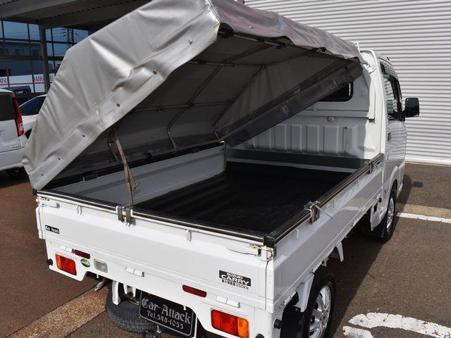 キャリイトラック ＫＣエアコン・パワステ　４ＷＤ　５速マニュアル　左右開閉ホロ　エアコン　パワステ　純正ラジオ　Ｗエアバック　アルミホイール　荷台ゴムマット　荷台プロテクター　車内マット　ドアバイザー（5枚目）