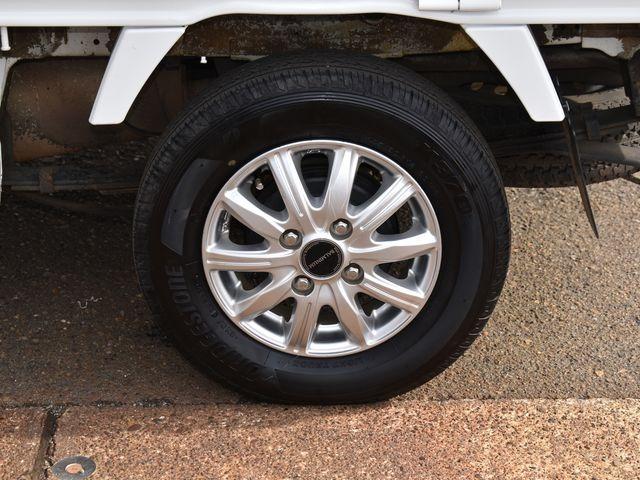 キャリイトラック ＫＣエアコン・パワステ　４ＷＤ　５速マニュアル　左右開閉ホロ　エアコン　パワステ　純正ラジオ　Ｗエアバック　アルミホイール　荷台ゴムマット　荷台プロテクター　車内マット　ドアバイザー（31枚目）