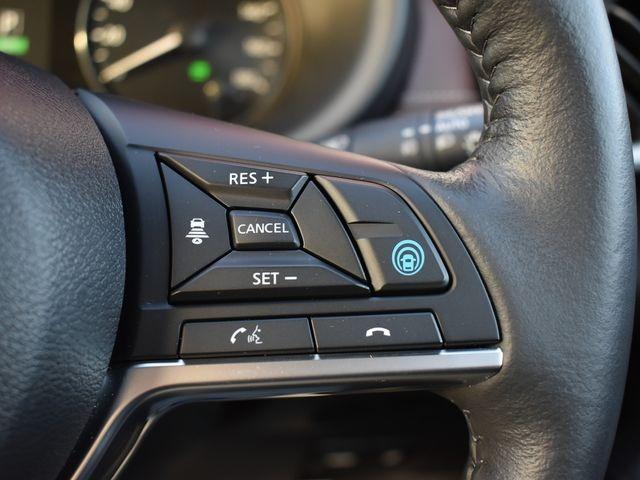 キックス Ｘ　ＦＯＵＲ　ツートーンインテリアエディション　ブラウン内装　４ＷＤ　純正９インチナビＴＶ　アラウンドビューＭ　ドラレコ　プロパイロット　ＥＴＣ　レザーシート　インテリジェントルームミラー　シートヒーター　純正アルミ　ステアリングヒーター　禁煙車（10枚目）