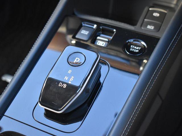 キックス Ｘ　ＦＯＵＲ　ツートーンインテリアエディション　ブラウン内装　４ＷＤ　純正９インチナビＴＶ　アラウンドビューＭ　ドラレコ　プロパイロット　ＥＴＣ　レザーシート　インテリジェントルームミラー　シートヒーター　純正アルミ　ステアリングヒーター　禁煙車（21枚目）