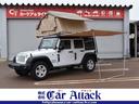 ジープ・ラングラーアンリミテッド スポーツ　４ＷＤ　スミティビルト製ルーフテント　オーニング　バハラックルーフキャリア　ナビＴＶ　バックカメラ　後期モデル　クルーズコントロール　背面タイヤカバー　サイドカメラ　キーレス　ＥＴＣ　ワンオーナー車（2枚目）