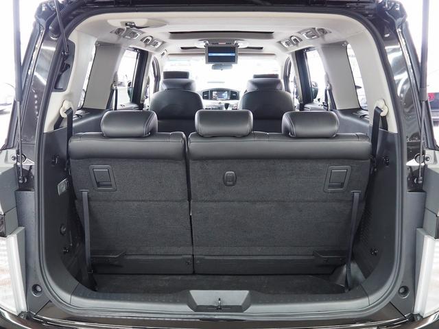 エルグランド ライダー ブラックライン 黒本革シート メーカーHDDナビ 後席モニター BOSE サンルーフ 黒革 両側パワスラ Pバックドア シートヒーター Fエアロ クルコン 地デジ 全周囲M オットマン LEDヘッドL ETC コーナーセンサー(54枚目)