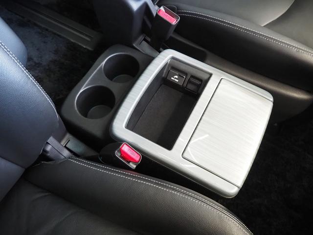 エルグランド ライダー ブラックライン 黒本革シート メーカーHDDナビ 後席モニター BOSE サンルーフ 黒革 両側パワスラ Pバックドア シートヒーター Fエアロ クルコン 地デジ 全周囲M オットマン LEDヘッドL ETC コーナーセンサー(64枚目)