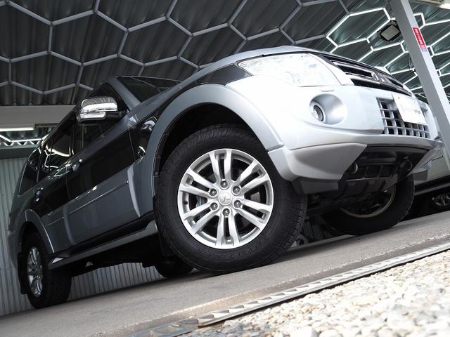 パジェロ ロング　スーパーエクシード　４ＷＤ　純正ＳＤナビ　黒革　シートヒーター　ロックフォード　ＥＴＣ　ウッドコンビＨ　ステアスイッチ　地デジ　Ｂカメラ　クルコン　ＨＩＤ　Ｂフォグ　キーレス　サイドステップ　ディーゼルＴ　純正１８ＡＷ（25枚目）