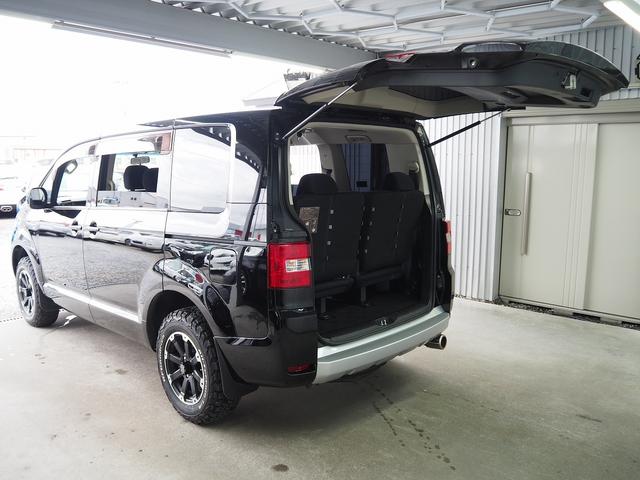 デリカＤ：５ Ｄ　パワーパッケージ　４ＷＤ　ストラーダＳＤナビ　両側パワスラ　前席シートヒーター　社外１６ＡＷ　ブルバー　地デジ　Ｂカメラ　ＥＴＣ　クルコン　パドルシフト　ディーゼルターボ　スマートキー　スモークフィルム　ＨＩＤ　フォグ（50枚目）