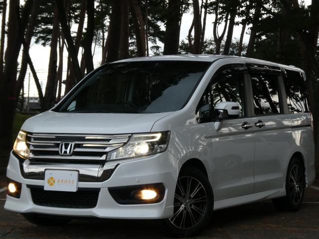 ステップワゴンスパーダ Ｚ　クールスピリット　９インチ純正メモリーナビ　両側電動スライドドア　クリアランスソナー　ハーフレザーシート　クルコン　バックカメラ　ウィンカーミラー　ＥＴＣ　ステアリングスイッチ　パドルシフト　オートＡ／Ｃ・ライト（2枚目）