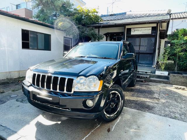 ジープ・グランドチェロキー リミテッド　４ＷＤ、ＨＤＤナビ、バックカメラ、革シート、運転席助手席エアバッグ、パワーシート、シートヒーター、コーナーセンサー、社外アルミ、オートエアコン、キーレスエントリー、走行８７７７６ｋｍ、２年車検整備付き（5枚目）