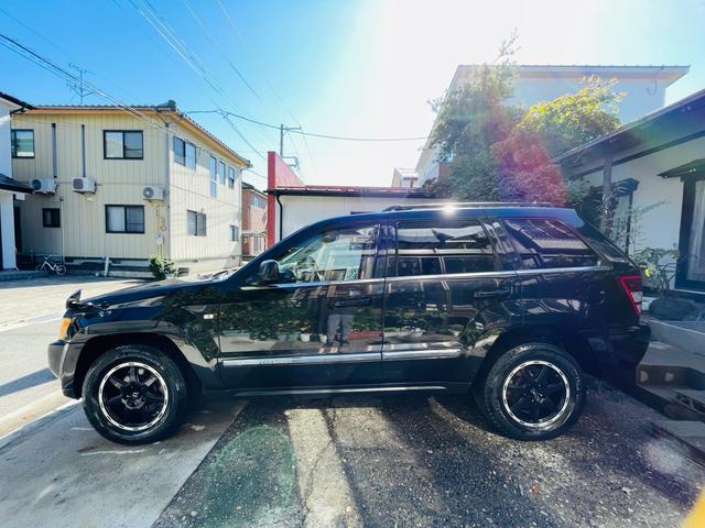 ジープ・グランドチェロキー リミテッド　４ＷＤ、ＨＤＤナビ、バックカメラ、革シート、運転席助手席エアバッグ、パワーシート、シートヒーター、コーナーセンサー、社外アルミ、オートエアコン、キーレスエントリー、走行８７７７６ｋｍ、２年車検整備付き（7枚目）