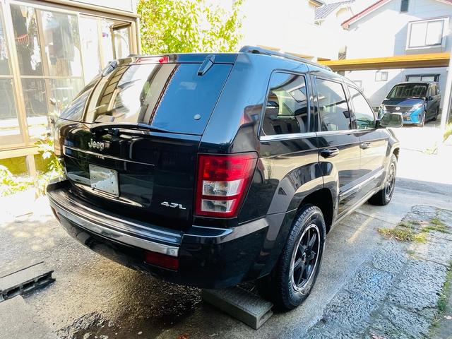 ジープ・グランドチェロキー リミテッド　４ＷＤ、ＨＤＤナビ、バックカメラ、革シート、運転席助手席エアバッグ、パワーシート、シートヒーター、コーナーセンサー、社外アルミ、オートエアコン、キーレスエントリー、走行８７７７６ｋｍ、２年車検整備付き（9枚目）