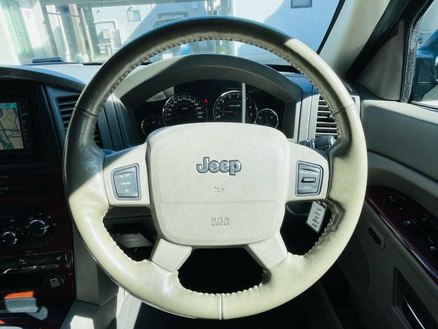 ジープ・グランドチェロキー リミテッド　４ＷＤ、ＨＤＤナビ、バックカメラ、革シート、運転席助手席エアバッグ、パワーシート、シートヒーター、コーナーセンサー、社外アルミ、オートエアコン、キーレスエントリー、走行８７７７６ｋｍ、２年車検整備付き（13枚目）