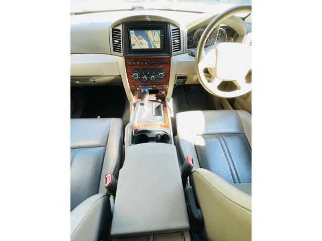 ジープ・グランドチェロキー リミテッド　４ＷＤ、ＨＤＤナビ、バックカメラ、革シート、運転席助手席エアバッグ、パワーシート、シートヒーター、コーナーセンサー、社外アルミ、オートエアコン、キーレスエントリー、走行８７７７６ｋｍ、２年車検整備付き（15枚目）