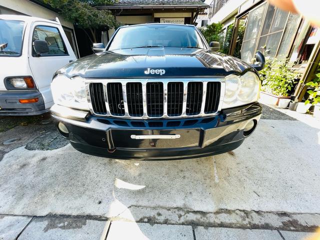 ジープ・グランドチェロキー リミテッド　４ＷＤ、ＨＤＤナビ、バックカメラ、革シート、運転席助手席エアバッグ、パワーシート、シートヒーター、コーナーセンサー、社外アルミ、オートエアコン、キーレスエントリー、走行８７７７６ｋｍ、２年車検整備付き（56枚目）