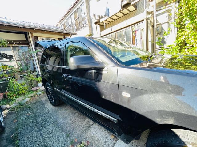 ジープ・グランドチェロキー リミテッド　４ＷＤ、ＨＤＤナビ、バックカメラ、革シート、運転席助手席エアバッグ、パワーシート、シートヒーター、コーナーセンサー、社外アルミ、オートエアコン、キーレスエントリー、走行８７７７６ｋｍ、２年車検整備付き（58枚目）