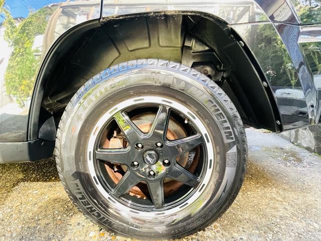 ジープ・グランドチェロキー リミテッド　４ＷＤ、ＨＤＤナビ、バックカメラ、革シート、運転席助手席エアバッグ、パワーシート、シートヒーター、コーナーセンサー、社外アルミ、オートエアコン、キーレスエントリー、走行８７７７６ｋｍ、２年車検整備付き（68枚目）