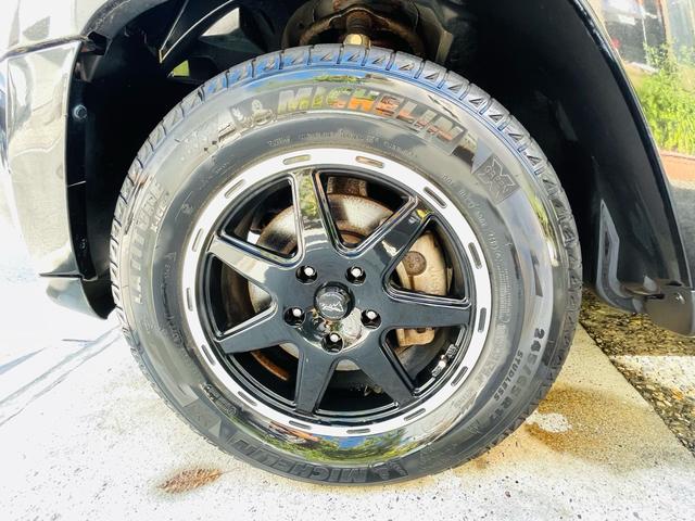ジープ・グランドチェロキー リミテッド　４ＷＤ、ＨＤＤナビ、バックカメラ、革シート、運転席助手席エアバッグ、パワーシート、シートヒーター、コーナーセンサー、社外アルミ、オートエアコン、キーレスエントリー、走行８７７７６ｋｍ、２年車検整備付き（69枚目）