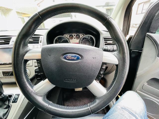 クーガ 4WD、革シート、サンルーフ、デジタルナビTV、ETC、パワーシート、シートヒーター、クルーズコントロール、Bluetooth、USB端子、純正アルミ、ルーフレール、2年車検整備付き(34枚目)