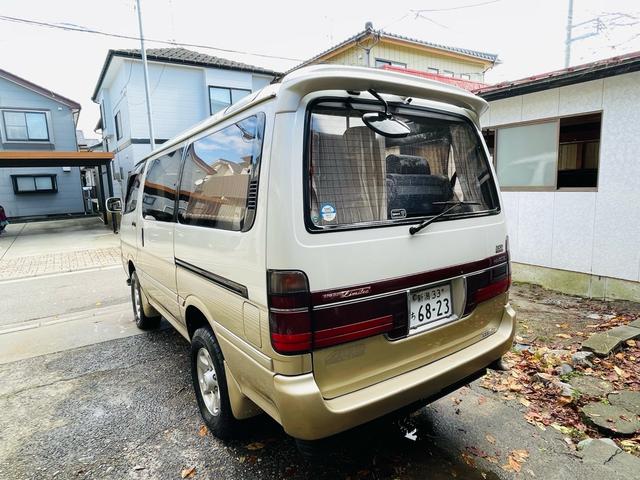 ハイエースワゴン スーパーカスタムリミテッド　４ＷＤ、ディーゼルターボ、エンジンスターター、ドライブレコーダー、Ｗサンルーフ、パワースライドドア、Ｗエアコン、ナビＴＶ、リアカーテン、ＥＴＣ、純正アルミ、キーレスエントリー、二年車検整備付き（6枚目）