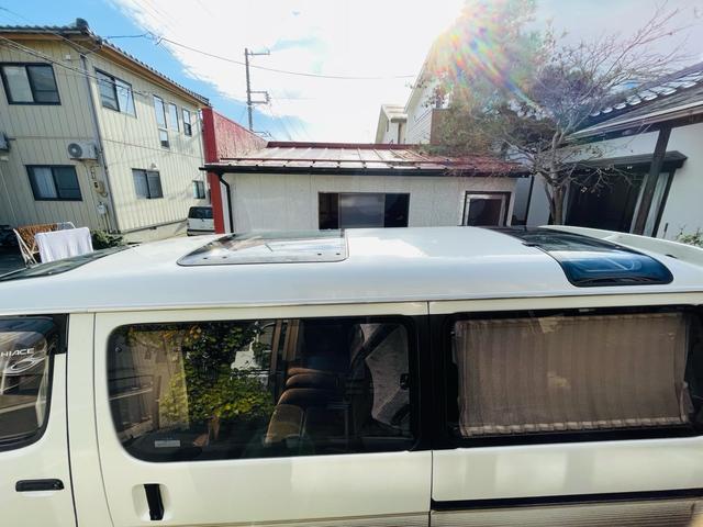 ハイエースワゴン スーパーカスタムリミテッド　４ＷＤ、ディーゼルターボ、エンジンスターター、ドライブレコーダー、Ｗサンルーフ、パワースライドドア、Ｗエアコン、ナビＴＶ、リアカーテン、ＥＴＣ、純正アルミ、キーレスエントリー、二年車検整備付き（11枚目）