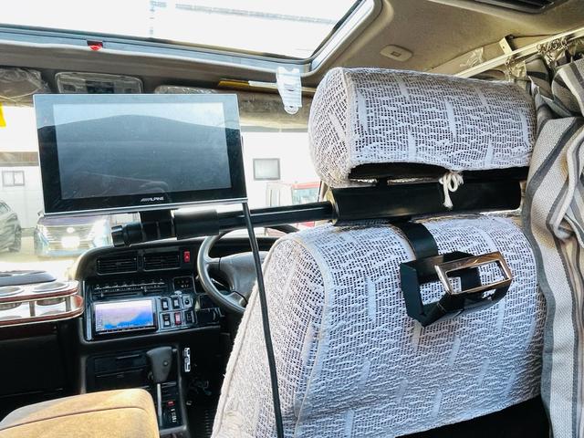 ハイエースワゴン スーパーカスタムリミテッド　４ＷＤ、ディーゼルターボ、エンジンスターター、ドライブレコーダー、Ｗサンルーフ、パワースライドドア、Ｗエアコン、ナビＴＶ、リアカーテン、ＥＴＣ、純正アルミ、キーレスエントリー、二年車検整備付き（56枚目）