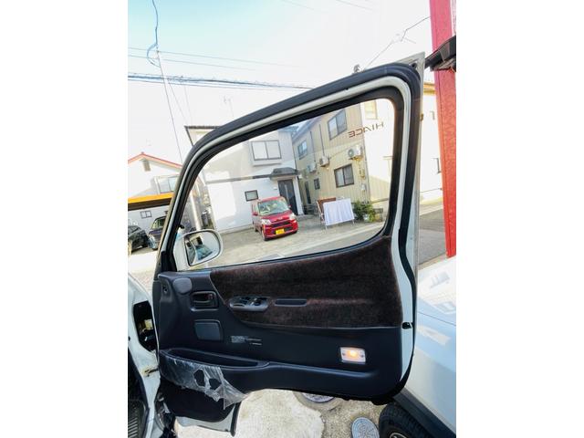 ハイエースワゴン スーパーカスタムリミテッド　４ＷＤ、ディーゼルターボ、エンジンスターター、ドライブレコーダー、Ｗサンルーフ、パワースライドドア、Ｗエアコン、ナビＴＶ、リアカーテン、ＥＴＣ、純正アルミ、キーレスエントリー、二年車検整備付き（58枚目）