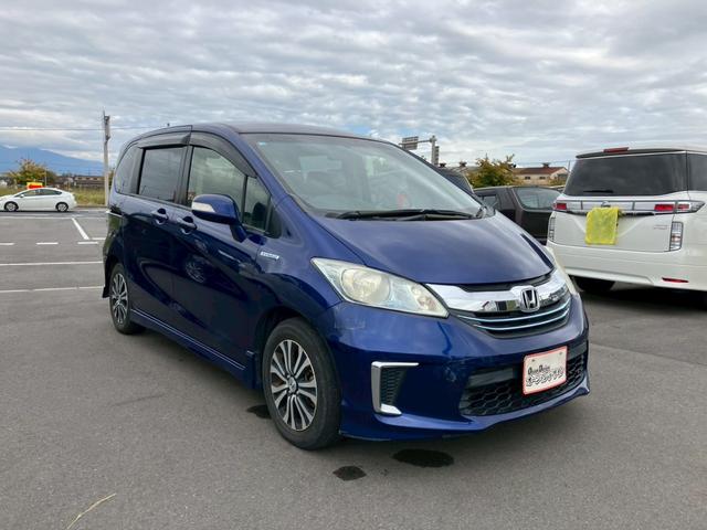 フリードハイブリッド ジャストセレクション 車検整備付 スマートキー クルーズコントロール 両側パワースライドドア ディスチャージライト コンフォートビューモニター エアコン パワーステアリング パワーウインドウ(7枚目)