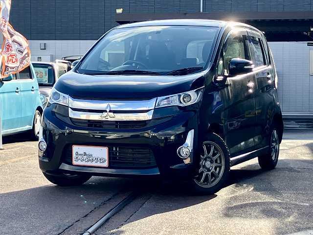 ｅＫカスタム Ｇ　検２年　社外ナビ　バックカメラ　ＴＶ　アイドリングストップ　プッシュスタート　ウィンカーミラー　ベンチシート　シートヒーター　オートエアコン　アルミホイール（7枚目）