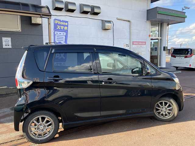 ｅＫカスタム Ｇ　検２年　社外ナビ　バックカメラ　ＴＶ　アイドリングストップ　プッシュスタート　ウィンカーミラー　ベンチシート　シートヒーター　オートエアコン　アルミホイール（9枚目）