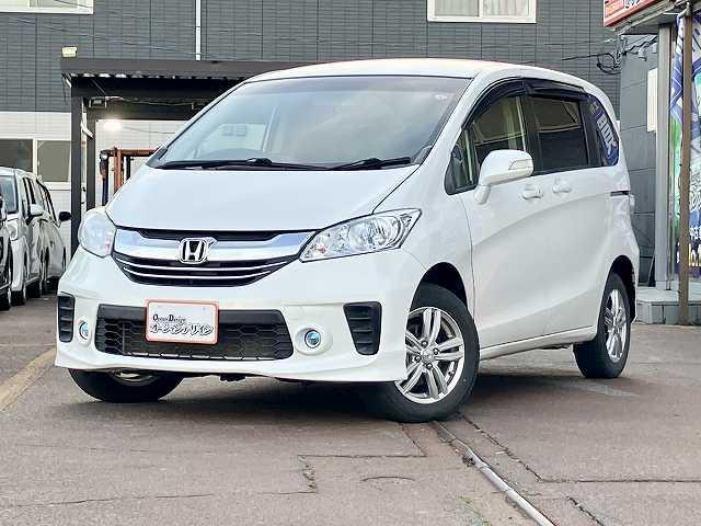 フリード Ｇ　ジャストセレクション　検２年　４ＷＤ　ＥＴＣ　ナビ　バックカメラ　オートエアコン　オートライト　左側電動スライドドア　Ｂｌｕｅｔｏｏｔｈ　社外アルミホイール　ウィンカーミラー　３列シート　フォグライト（6枚目）