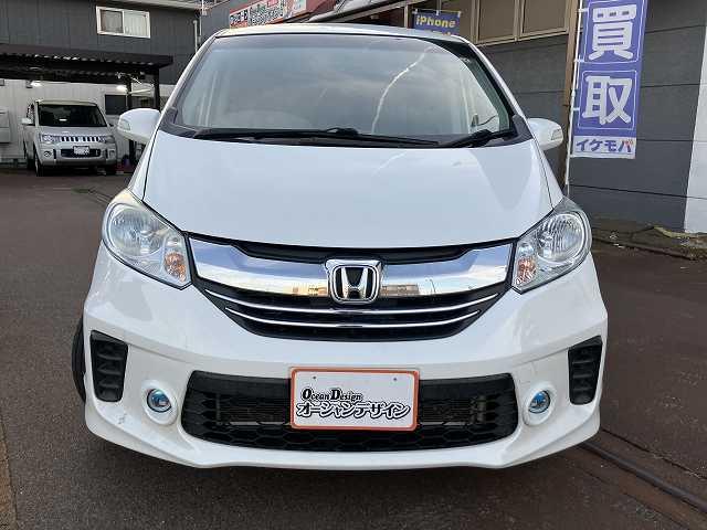 フリード Ｇ　ジャストセレクション　検２年　４ＷＤ　ＥＴＣ　ナビ　バックカメラ　オートエアコン　オートライト　左側電動スライドドア　Ｂｌｕｅｔｏｏｔｈ　社外アルミホイール　ウィンカーミラー　３列シート　フォグライト（8枚目）