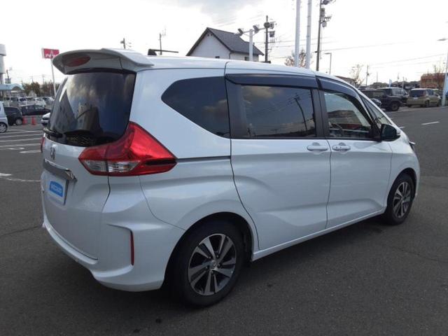 フリード Ｇ　新品タイヤ／保証書／純正　９インチ　メモリーナビ／ホンダセンシング／両側電動スライドドア／シートヒーター　前席／車線逸脱防止支援システム／シート　ハーフレザー／ドライブレコーダー　純正　バックカメラ（3枚目）