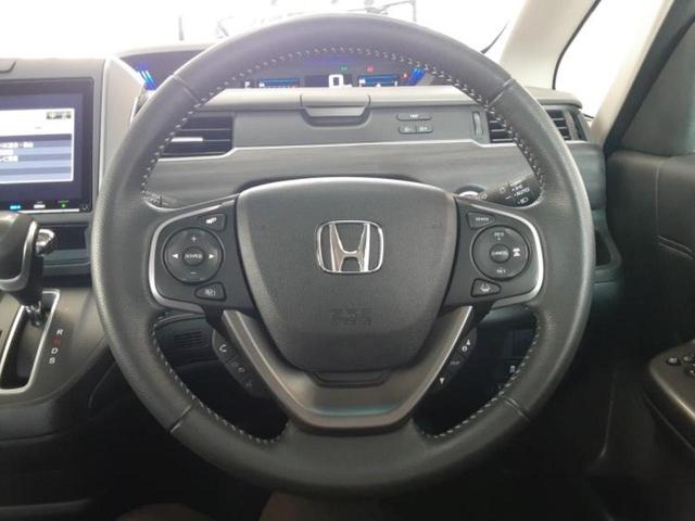 フリード Ｇ　新品タイヤ／保証書／純正　９インチ　メモリーナビ／ホンダセンシング／両側電動スライドドア／シートヒーター　前席／車線逸脱防止支援システム／シート　ハーフレザー／ドライブレコーダー　純正　バックカメラ（27枚目）