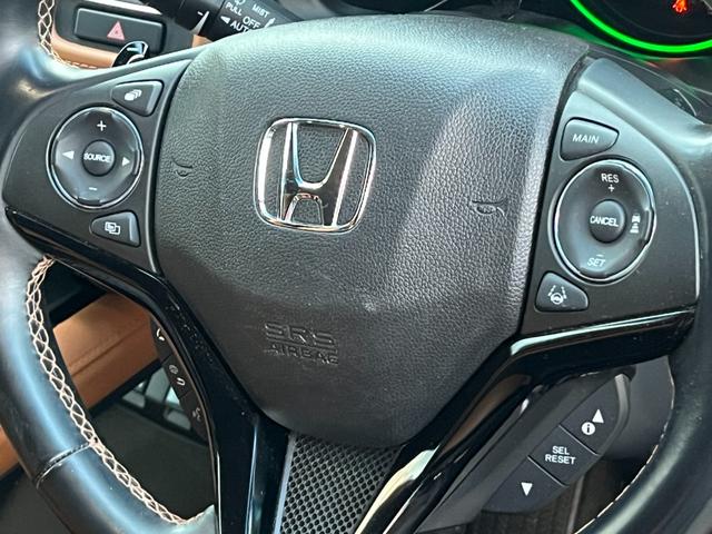 ヴェゼル ハイブリッドＺ・ホンダセンシング　４ＷＤ　Ｂｌｕｅｔｏｏｔｈ対応ナビ　バックカメラ　ミュージックサーバー　社外１６ＡＷ　スタッドレスタイヤ　ハーフレザーシート　シートヒーター（10枚目）