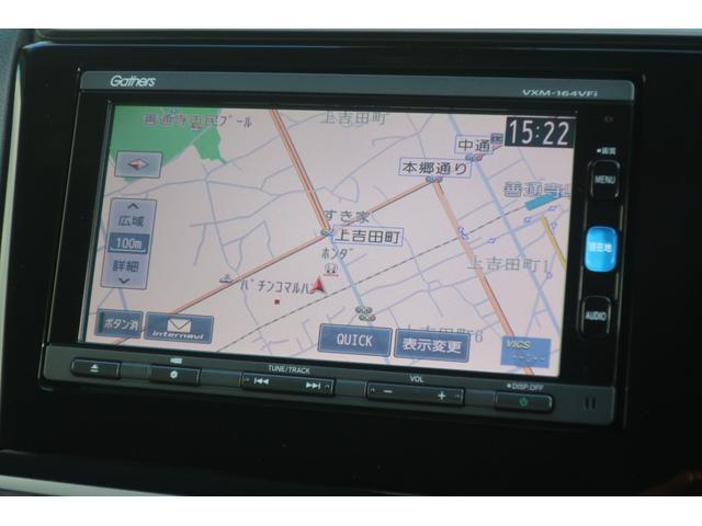 フィットハイブリッド Fパッケージ 禁煙前側ドライブレコーダーメモリーナビフルセグTVバックカメラサイドエアバックオートリトラミラーETC車載器スマートキーフルオートエアコン(3枚目)