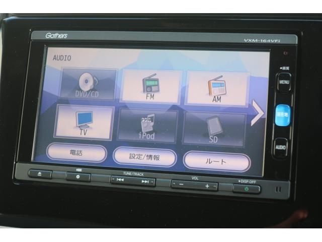 フィットハイブリッド Fパッケージ 禁煙前側ドライブレコーダーメモリーナビフルセグTVバックカメラサイドエアバックオートリトラミラーETC車載器スマートキーフルオートエアコン(4枚目)