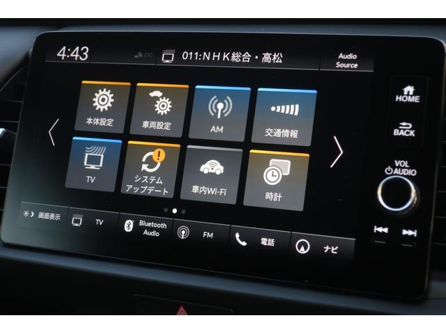 フィット ｅ：ＨＥＶホーム　当社社用車禁煙９インチメモリーナビフルセグＴＶバックカメラ前後パーキングセンサーサイドエアバックＥＴＣ車載器２．０スマートキーＬＥＤヘッドライト（5枚目）