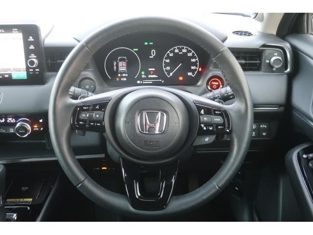 ヴェゼル ｅ：ＨＥＶＺ　ホンダコネクトナビ無限フルエアロ後退出庫サポートパワーゲートブラインドスポットインフォメーションＥＴＣ車載器Ｆシートヒーターマルチビューカメラコンビシート１８インチアルミホイール（16枚目）