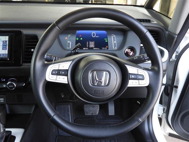 フィット ｅ：ＨＥＶホーム　社外ナビ　ＣＤ　Ｂｌｕｅｔｏｏｔｈ　バックカメラ　ＬＥＤヘッドライト　ＥＴＣ　ドラレコ　ステアリングスイッチ　レーダークルーズコントロール　ハーフレザー調シート　クリアランスソナー　電動格納ミラー（15枚目）