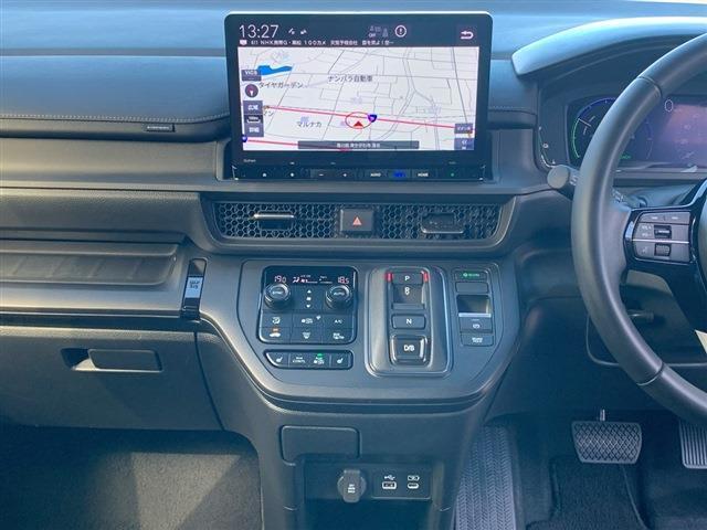 ステップワゴン ｅ：ＨＥＶスパーダ　純正１１．４インチナビ　ＴＶ　ＣＤ　ＤＶＤ　Ｂｌｕｅｔｏｏｔｈ　バックカメラ　両側パワースライドドア　ＬＥＤヘッドライト　ＬＥＤフォグ　ＥＴＣ　ハーフレザーシート　シートヒーター　純正１６インチＡＷ（19枚目）