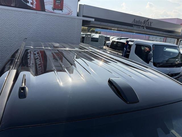 グランエース プレミアム　純正ディスプレイオーディオナビ・Ｂｌｕｅｔｏｏｔｈ　１２．１インチフリップダウンモニター　全周囲カメラ　両側パワースライドドア　黒レザーシート　シートヒーター　サイドステップ　デジタルインナーミラー（13枚目）