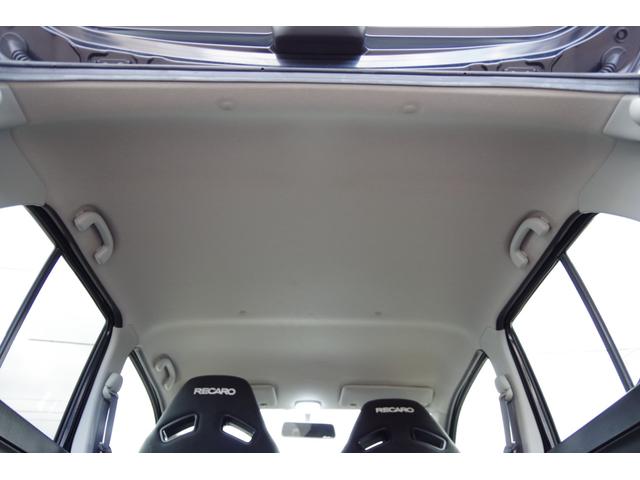 アルトワークス ベースグレード 5速マニュアル 15インチアルミ 社外新品10.1インチディスプレイオーディオ スマートキー2個 プッシュスタート 前席レカロシート キセノンライト パワステ パワーウィンドウ ウィンカードアミラー(42枚目)