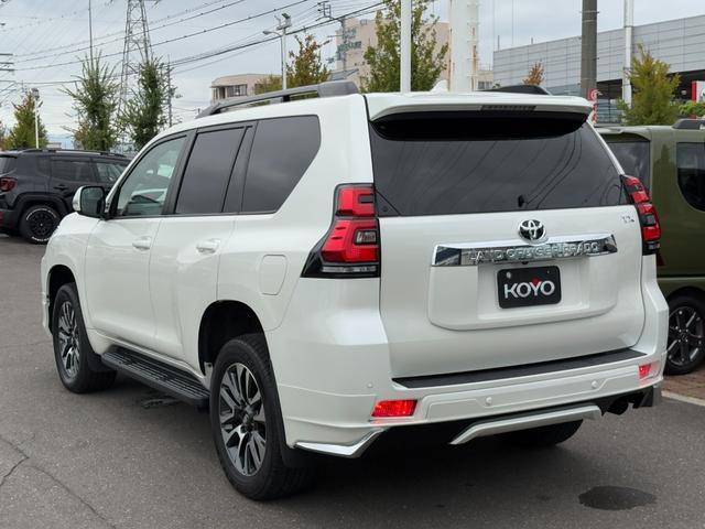 ランドクルーザープラド TX Lパッケージ 買取直販 寒冷地仕様 コムテック前後ドラレコ メーカー装着9型メモリーナビ 本革シート BSM RCTA パノラミックビューモニター 14スピーカー ルーフレール サンルーフ 純正19インチAW(49枚目)