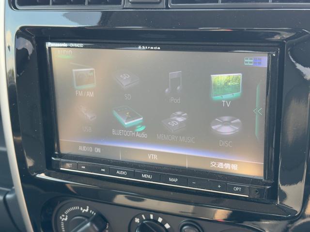 ジムニー ランドベンチャー パナソニックSDナビ フルセグTV バックモニター 革巻きステアリング ハーフレザーシート 運転席シートヒーター ETC車載器 サイドステップ LEDウィンカーミラー 純正16インチAW スペアタイヤ(9枚目)