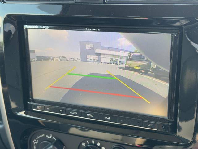 ジムニー ランドベンチャー パナソニックSDナビ フルセグTV バックモニター 革巻きステアリング ハーフレザーシート 運転席シートヒーター ETC車載器 サイドステップ LEDウィンカーミラー 純正16インチAW スペアタイヤ(10枚目)