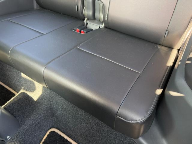 ジムニー ランドベンチャー パナソニックSDナビ フルセグTV バックモニター 革巻きステアリング ハーフレザーシート 運転席シートヒーター ETC車載器 サイドステップ LEDウィンカーミラー 純正16インチAW スペアタイヤ(25枚目)