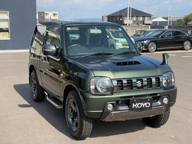 ジムニー ランドベンチャー パナソニックSDナビ フルセグTV バックモニター 革巻きステアリング ハーフレザーシート 運転席シートヒーター ETC車載器 サイドステップ LEDウィンカーミラー 純正16インチAW スペアタイヤ(28枚目)