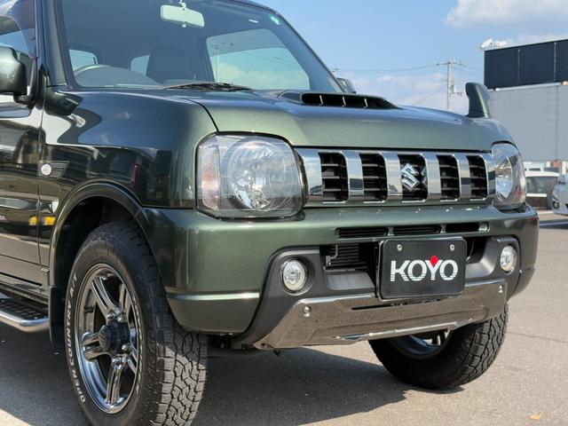 ジムニー ランドベンチャー パナソニックSDナビ フルセグTV バックモニター 革巻きステアリング ハーフレザーシート 運転席シートヒーター ETC車載器 サイドステップ LEDウィンカーミラー 純正16インチAW スペアタイヤ(31枚目)