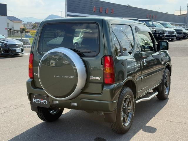 ジムニー ランドベンチャー パナソニックSDナビ フルセグTV バックモニター 革巻きステアリング ハーフレザーシート 運転席シートヒーター ETC車載器 サイドステップ LEDウィンカーミラー 純正16インチAW スペアタイヤ(36枚目)