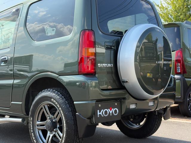 ジムニー ランドベンチャー パナソニックSDナビ フルセグTV バックモニター 革巻きステアリング ハーフレザーシート 運転席シートヒーター ETC車載器 サイドステップ LEDウィンカーミラー 純正16インチAW スペアタイヤ(37枚目)